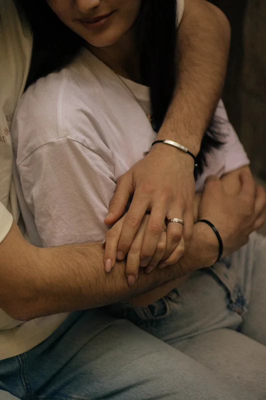 Couple embracing, showing affection and connection.